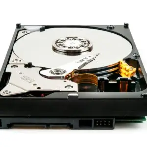 Detailed view of an open hard drive showcasing internal components against a white backdrop.